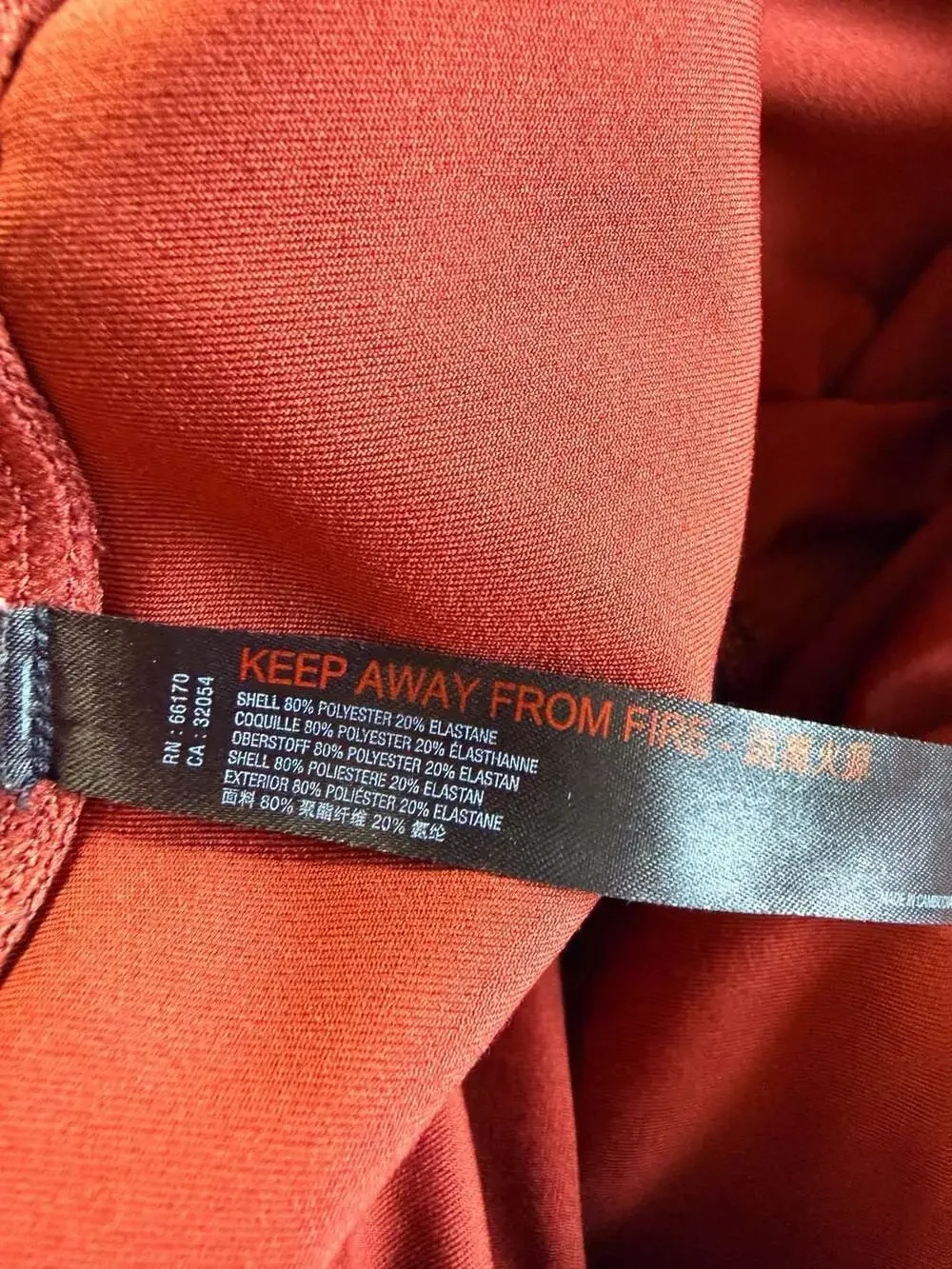 Free People Movement High Rise Cross-Waist Leggings in Burnt Orange